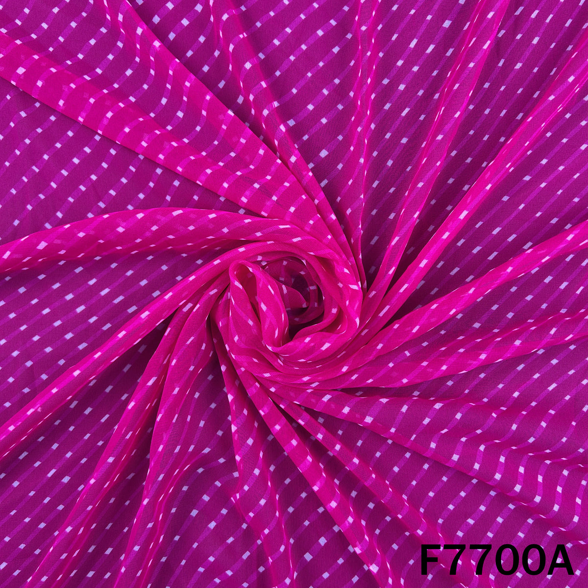 Draped pink georgette fabric with white dotted stripes