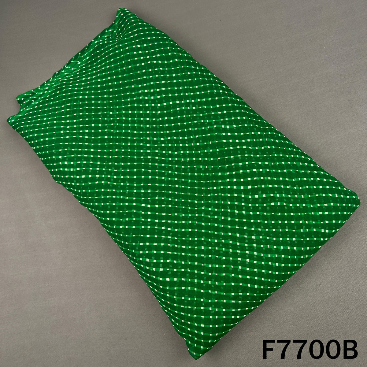 Green Laheriya georgette fabric with white dotted stripes