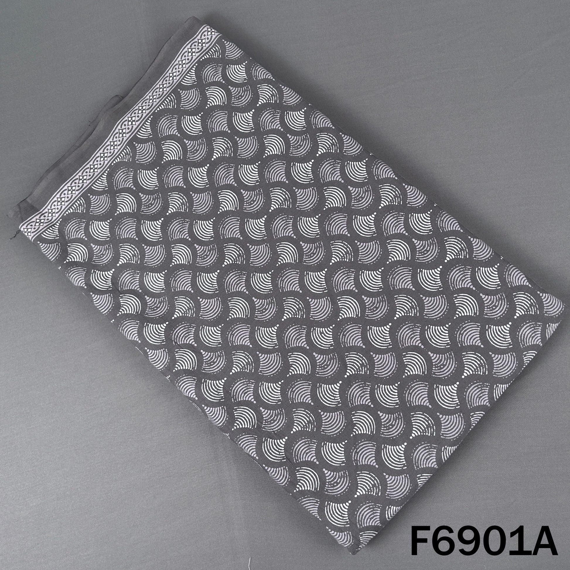 Charcoal grey cotton fabric F6901A featuring an orderly white leaf-inspired block pattern