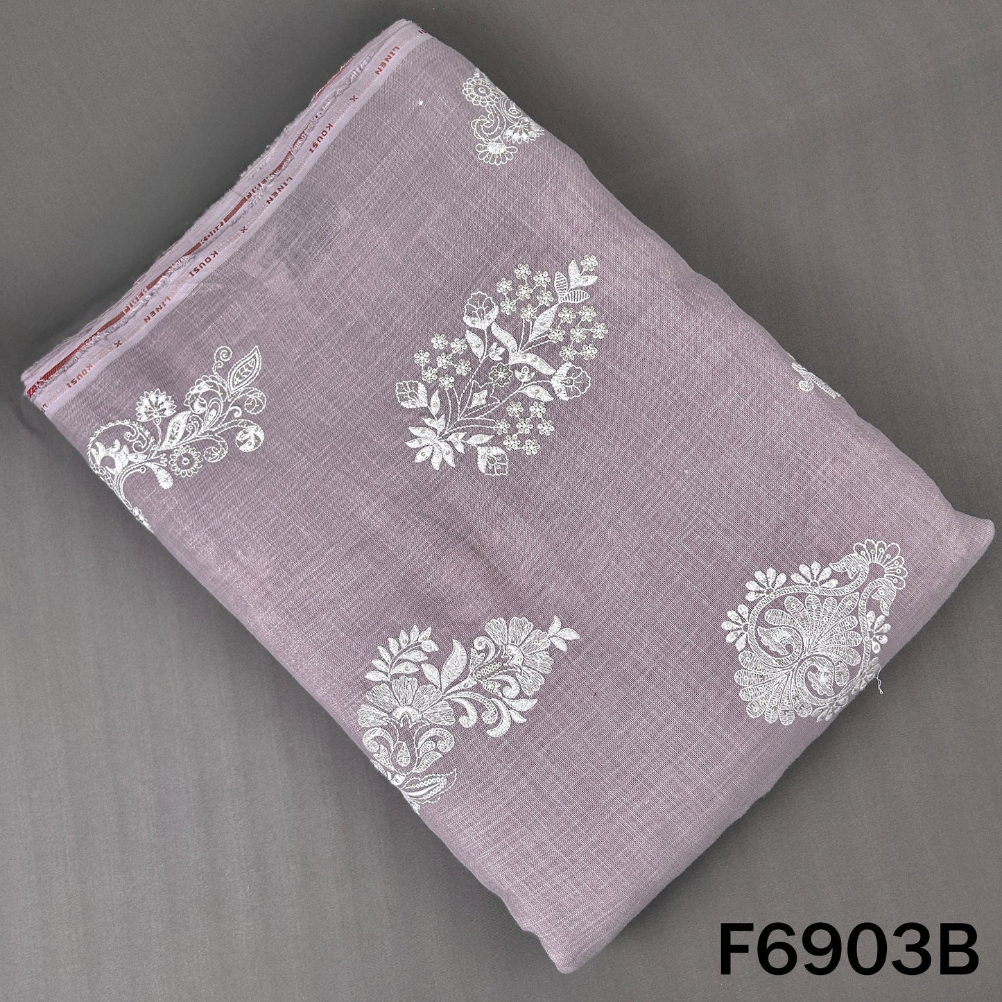 Grey linen fabric F6903B featuring ornate white embroidery for refined ethnic garments