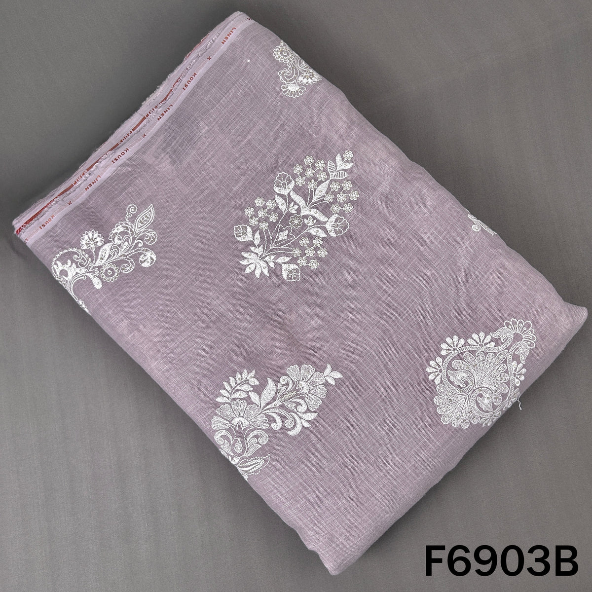 Grey linen fabric F6903B featuring ornate white embroidery for refined ethnic garments