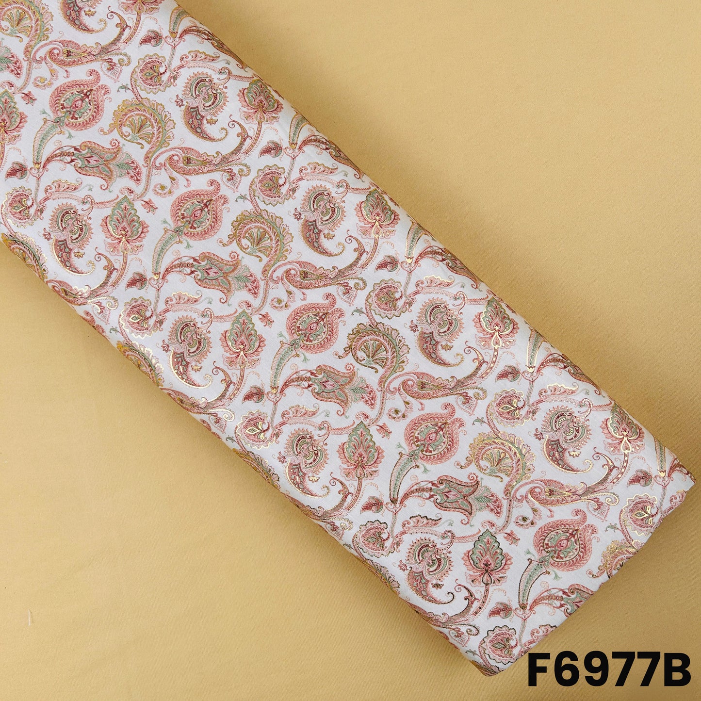 Ivory semi silk fabric F6977B decorated with delicate floral paisley print for festive outfits