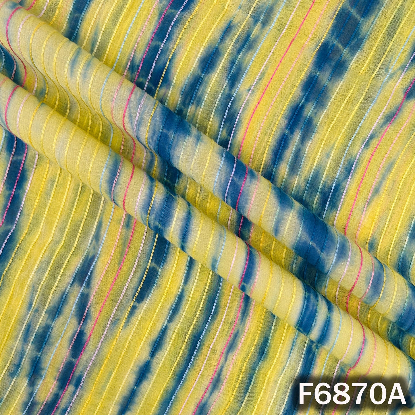 Close-up of multicolor striped Chanderi fabric with tie-dye effect