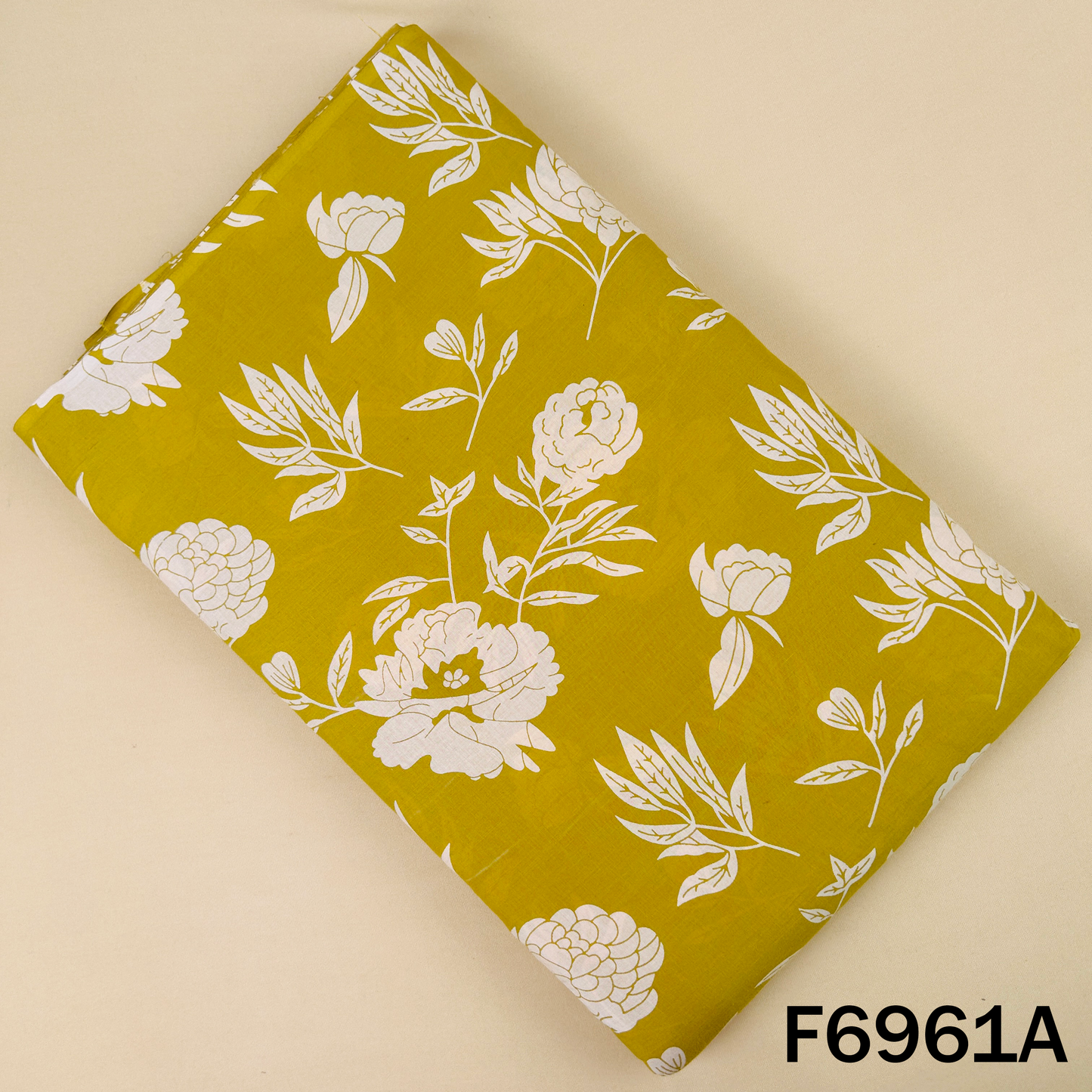 F6961A mustard cotton fabric featuring large white floral artwork for kurtis and ethnic outfits