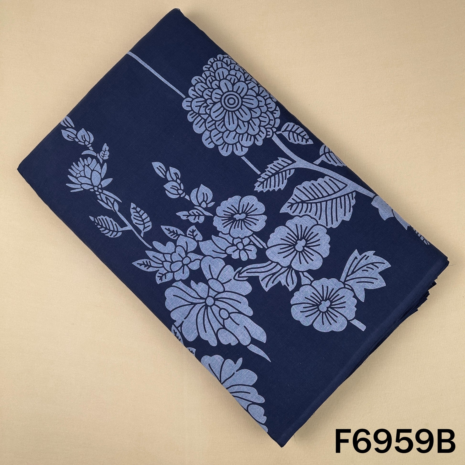 Navy blue Printed Cotton fabric F6959B designed with soft grey floral motifs for kurtis and suits