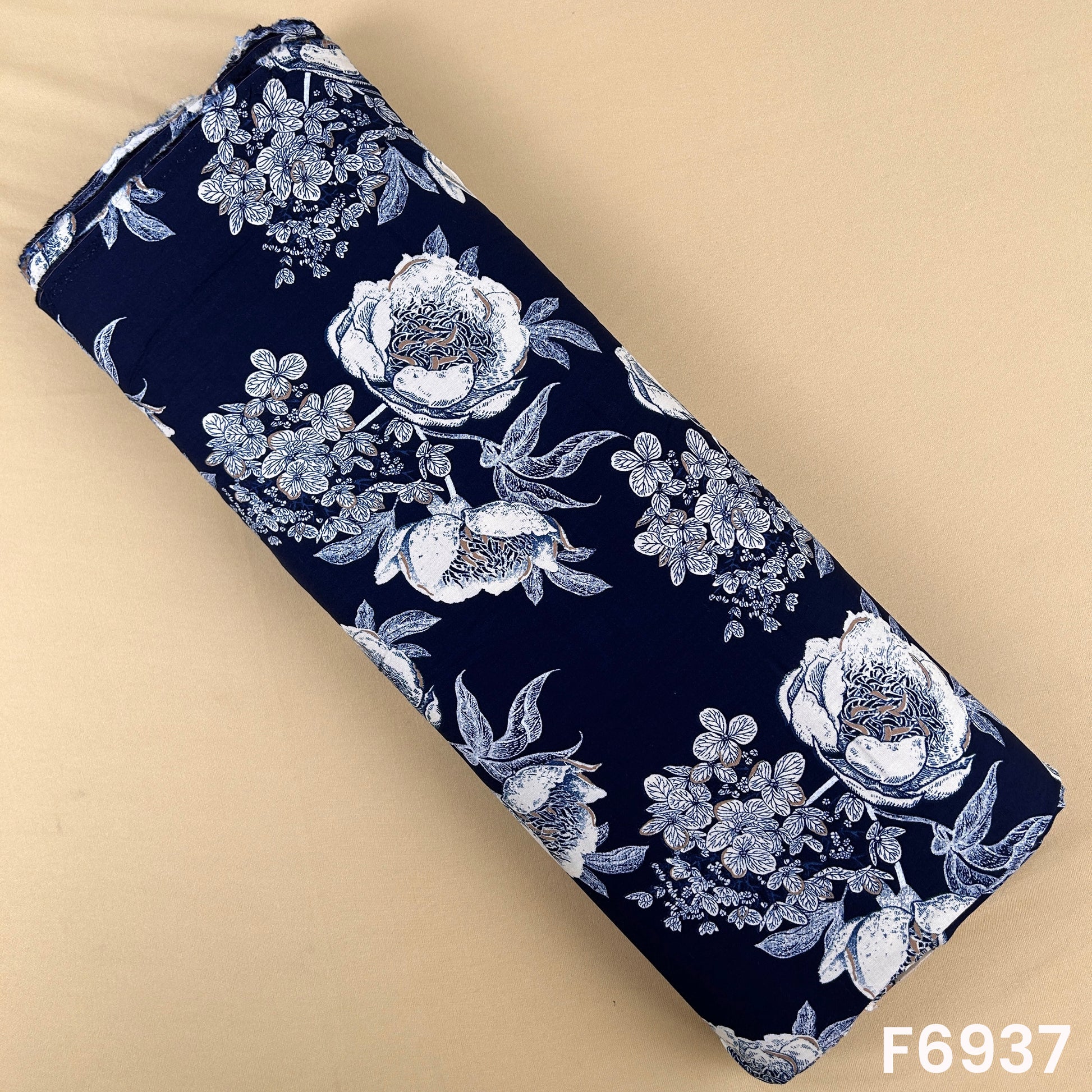 Navy printed rayon fabric F6937 with ivory blooming flowers, soft grey leaves and elegant botanical styling