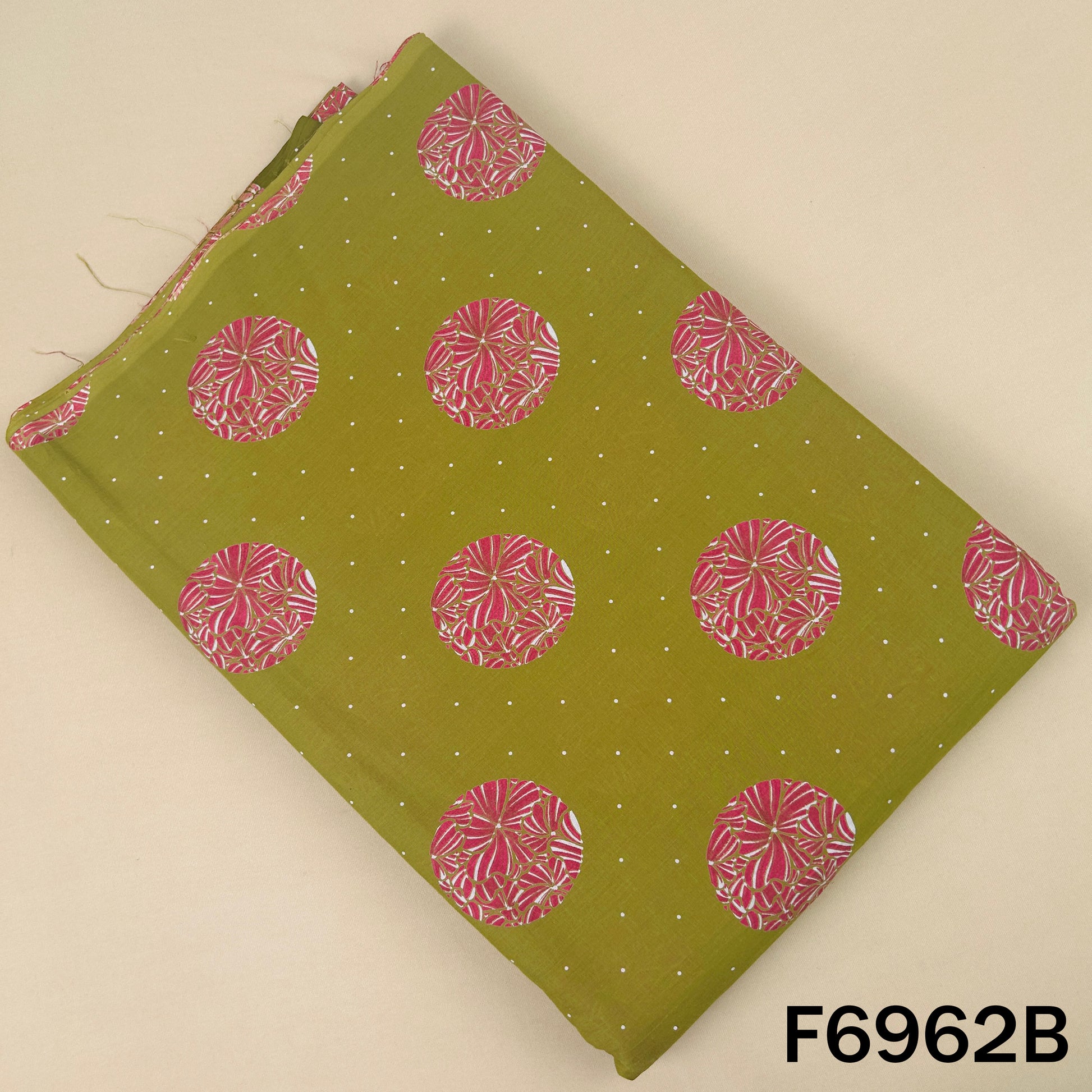 Olive green Printed Cotton fabric F6962B designed with bold pink floral circles for stylish everyday outfits