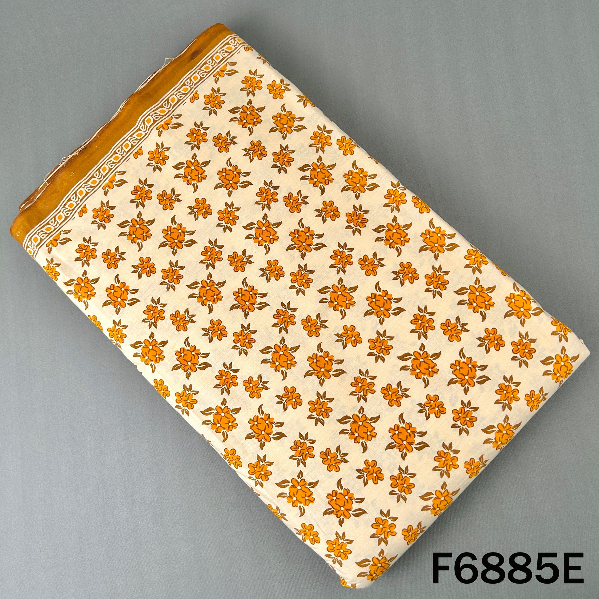 Orange block print cotton fabric F6885E with warm floral pattern for everyday Indian outfits