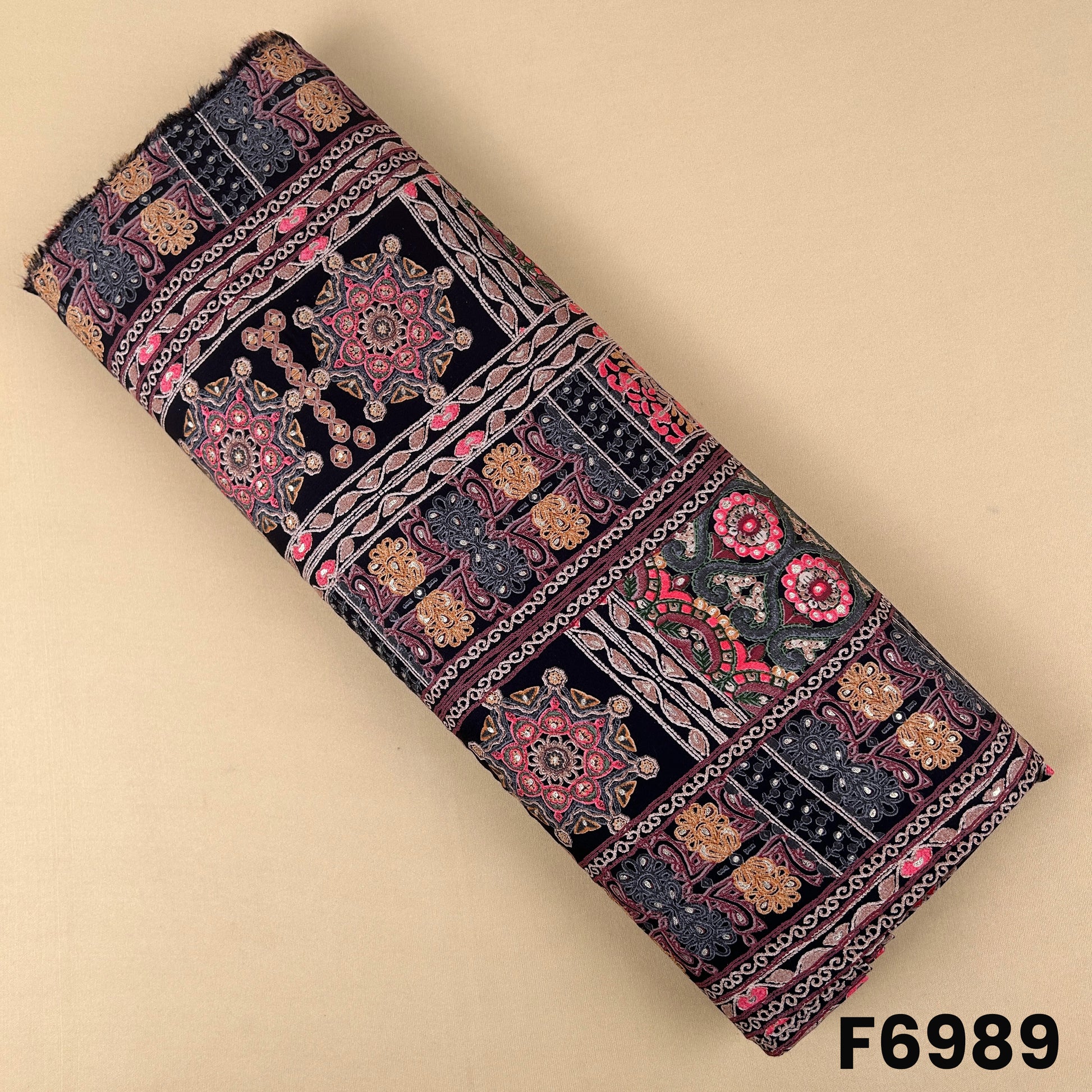 Black foil print rayon fabric F6989 with patchwork-inspired ethnic motifs, floral details and ornamental borders