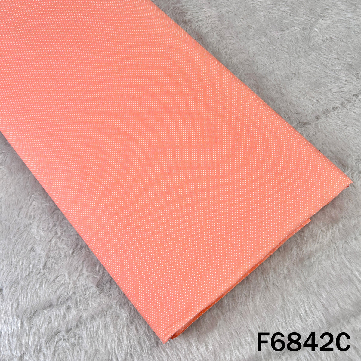 Peach Cambric Cotton fabric F6842C with subtle tiny dots for soft everyday wear