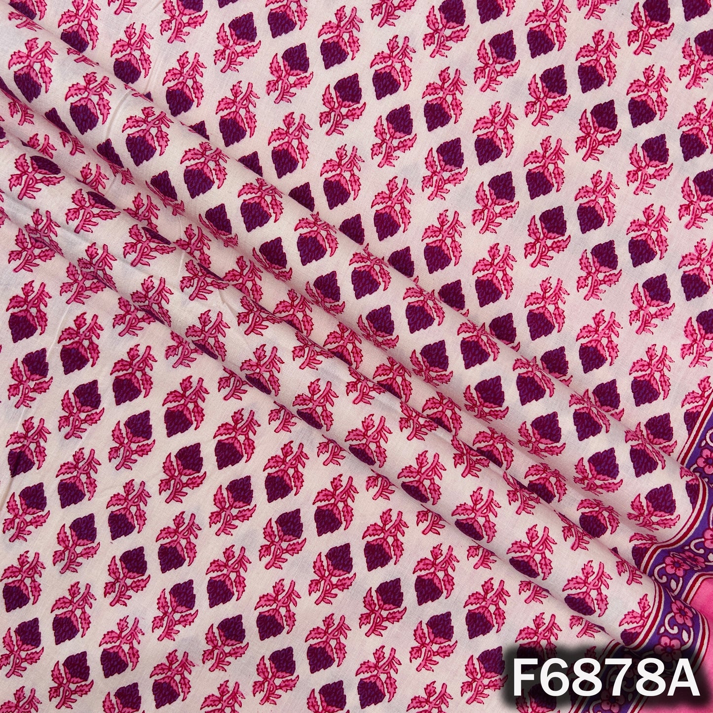 Close-up of pink floral block print cotton fabric F6878A with soft ethnic design
