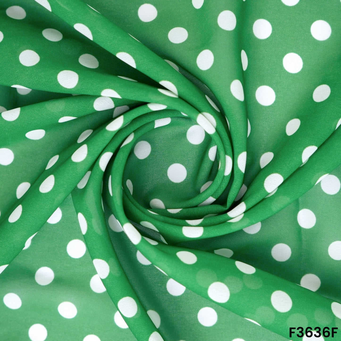 Green Polka Dot Georgette Fabric Draped Close-up