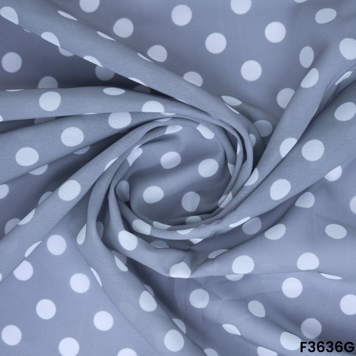 Grey Blue Polka Dot Georgette Fabric Draped Close-up