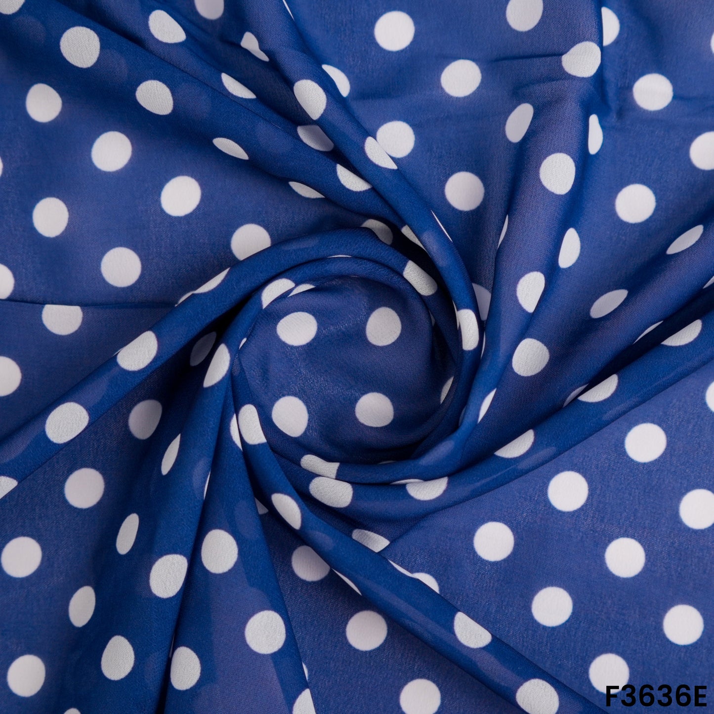 Navy Blue Polka Dot Georgette Fabric Draped Close-up