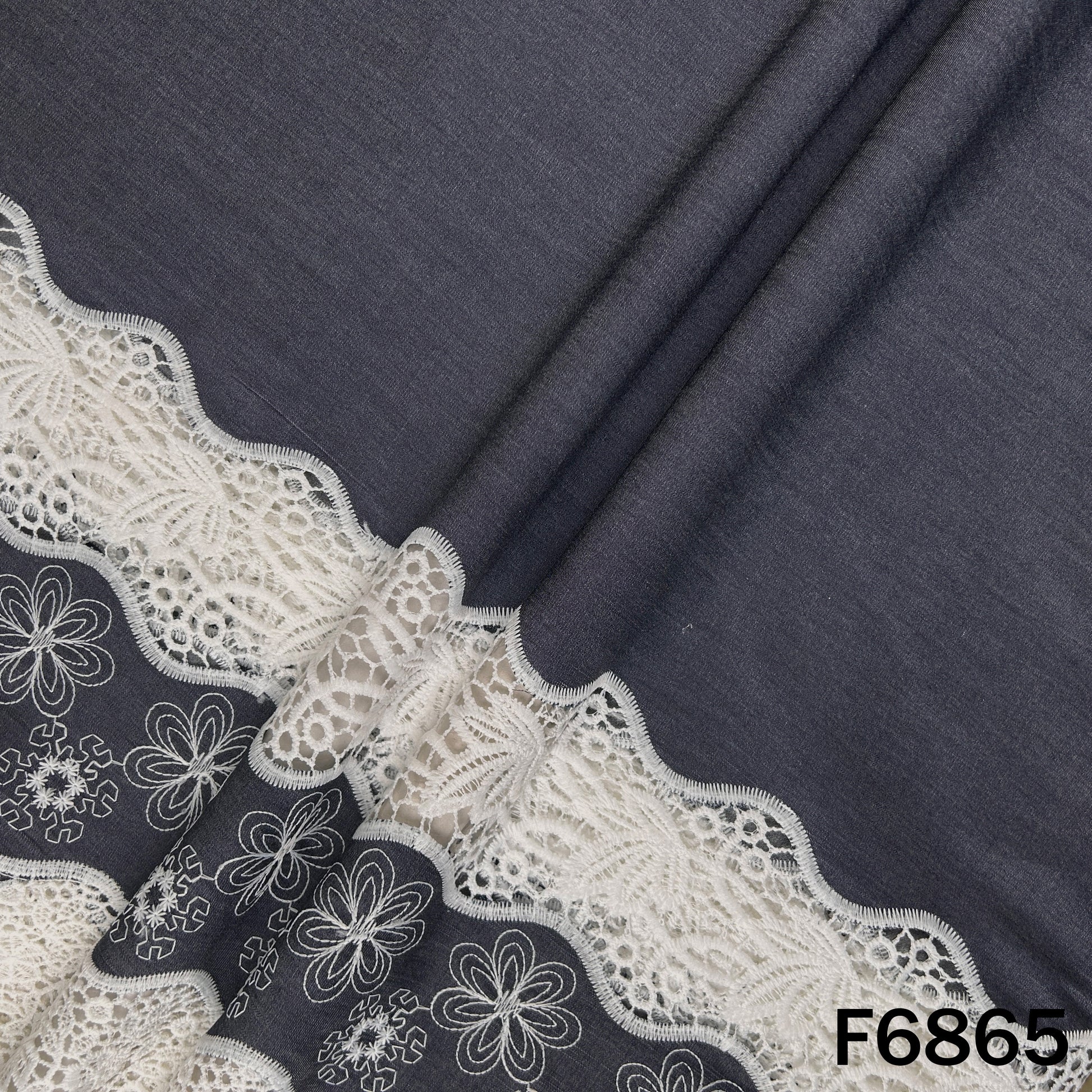 Premium white cotton denim fabric with embroidered lace border design