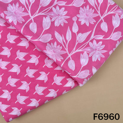 Pink Printed Cotton fabric F6960 with white floral and leaf artwork paired with a smaller coordinated motif pattern