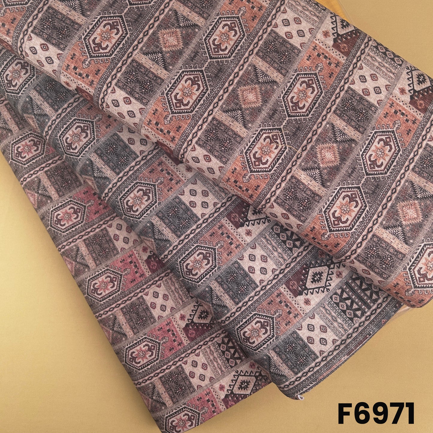 Printed Semi Linen fabric F6971 with tribal-inspired geometric motifs in mauve, dusty rose, charcoal and beige tones