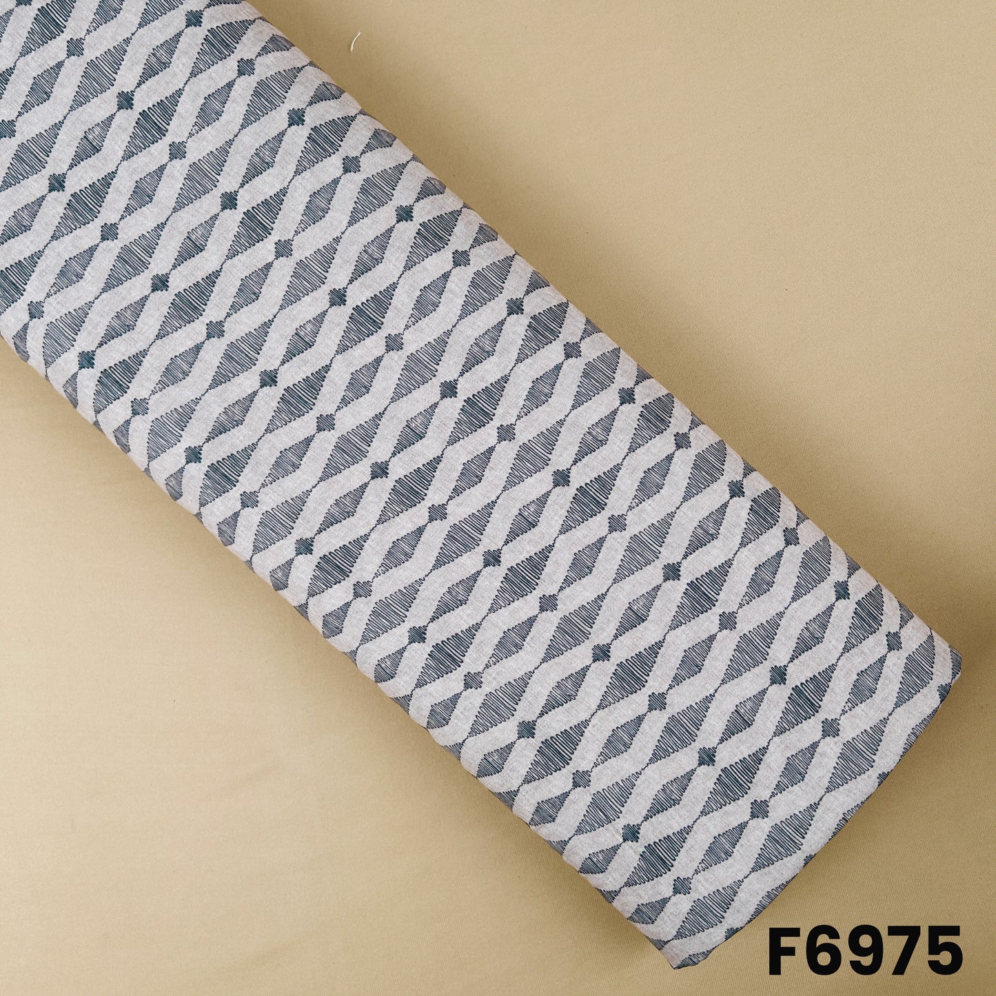 Printed Semi Linen fabric F6975 with charcoal grey linear geometric motifs on a soft natural beige base