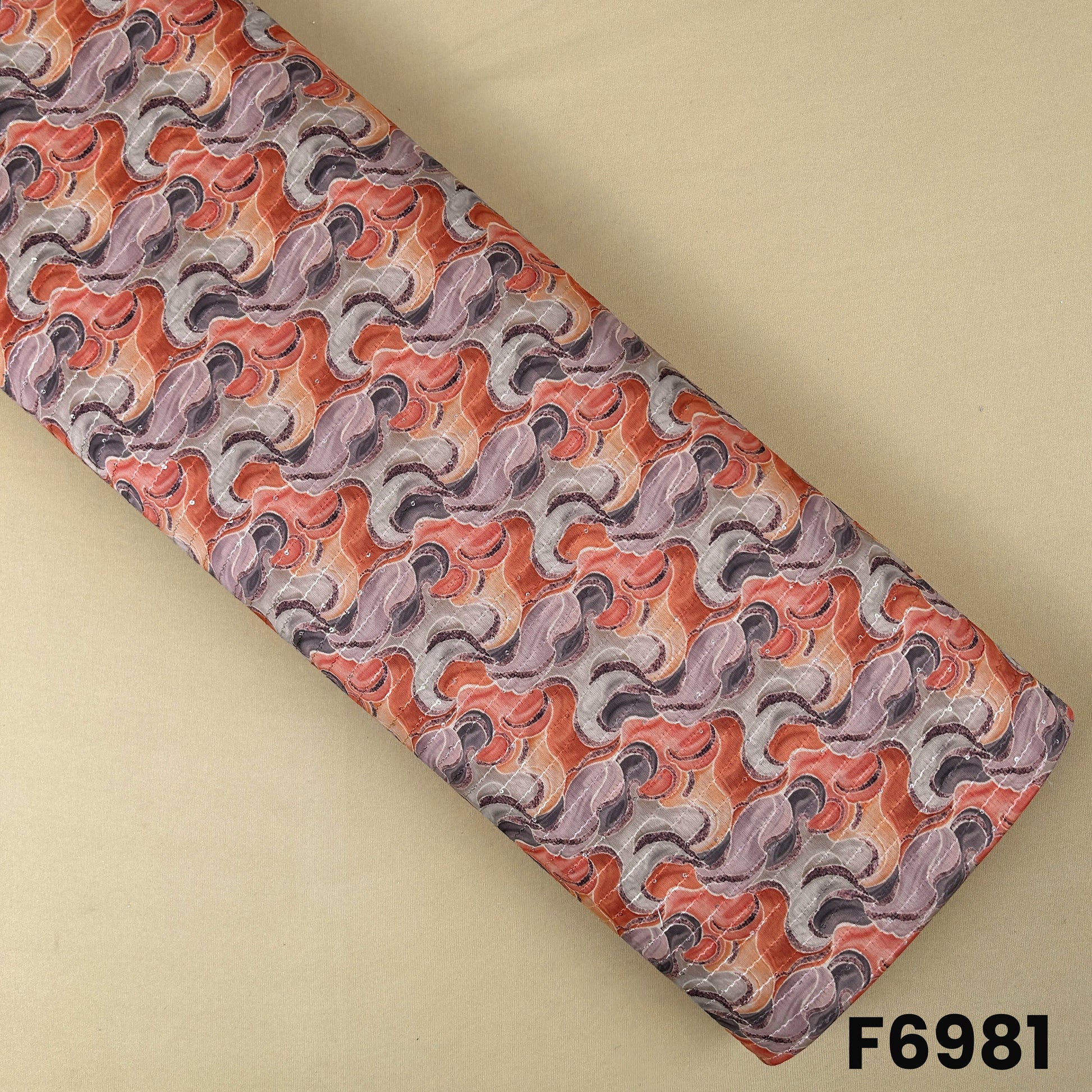 Semi silk fabric F6981 with abstract wave print in coral, peach, beige and taupe shades, enhanced with thread sequins detailing