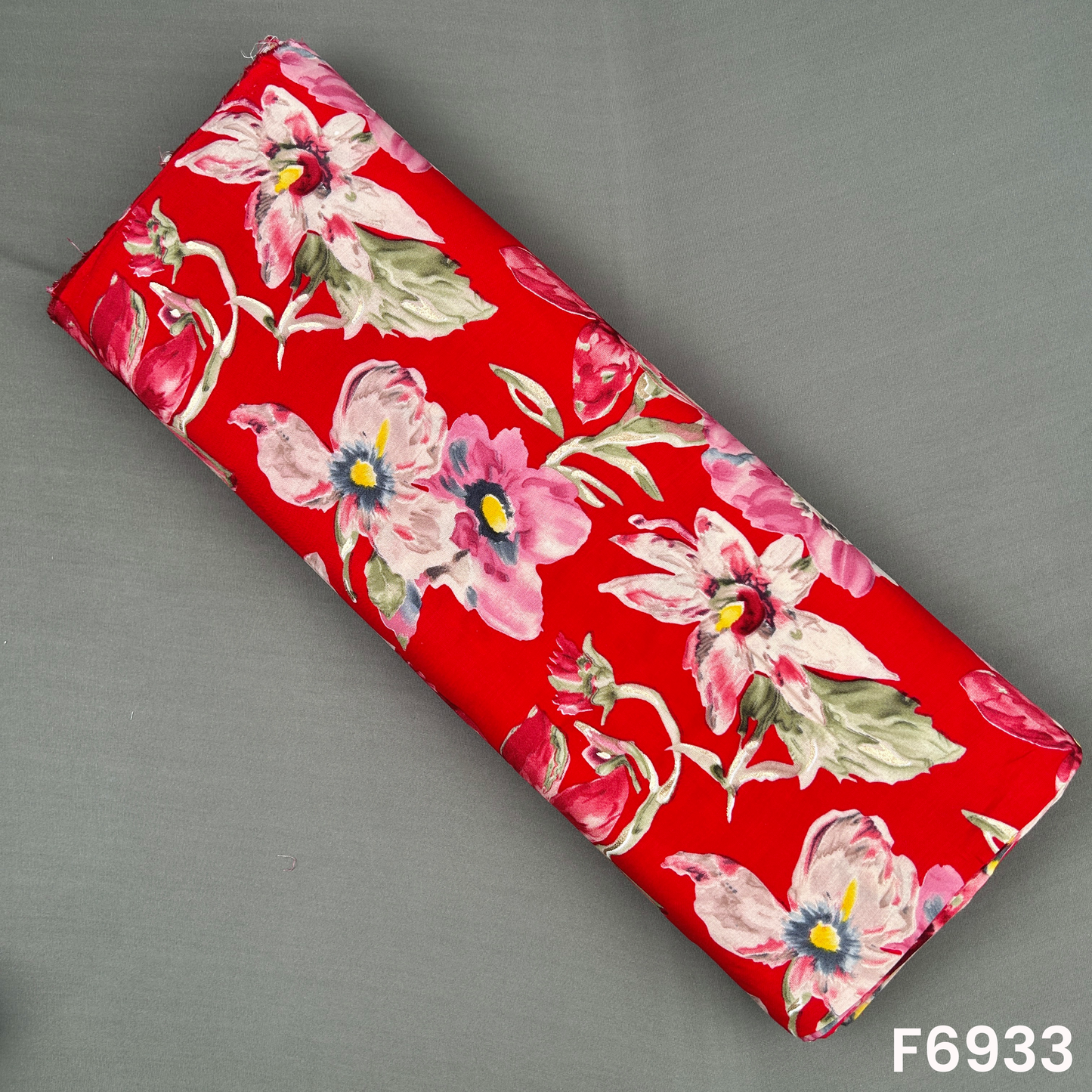 Rich red foil print rayon fabric F6933 with watercolor-style flowers, soft leaves and golden shimmer highlights