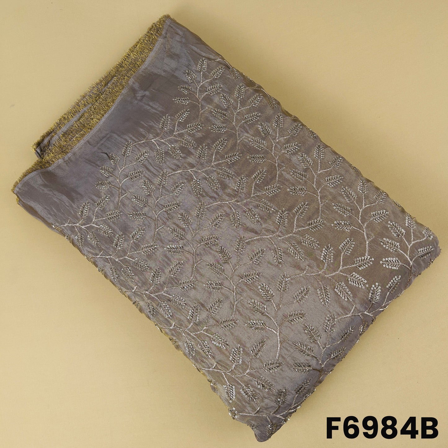 Taupe shimmer tissue fabric F6984B decorated with rich embroidered motifs for premium ethnic outfits