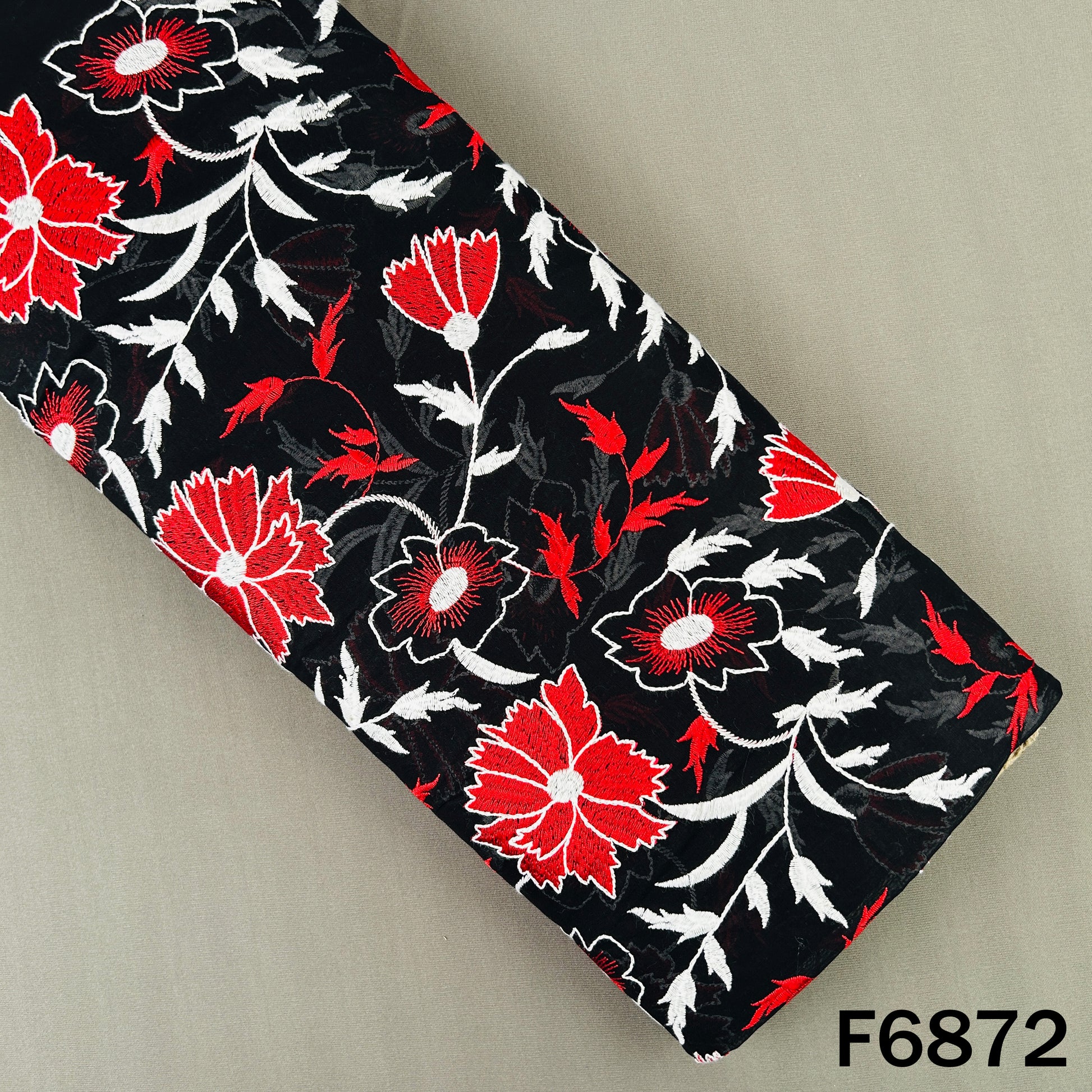 Black 2x2 Rubia cotton fabric F6872 with red and white floral thread embroidery