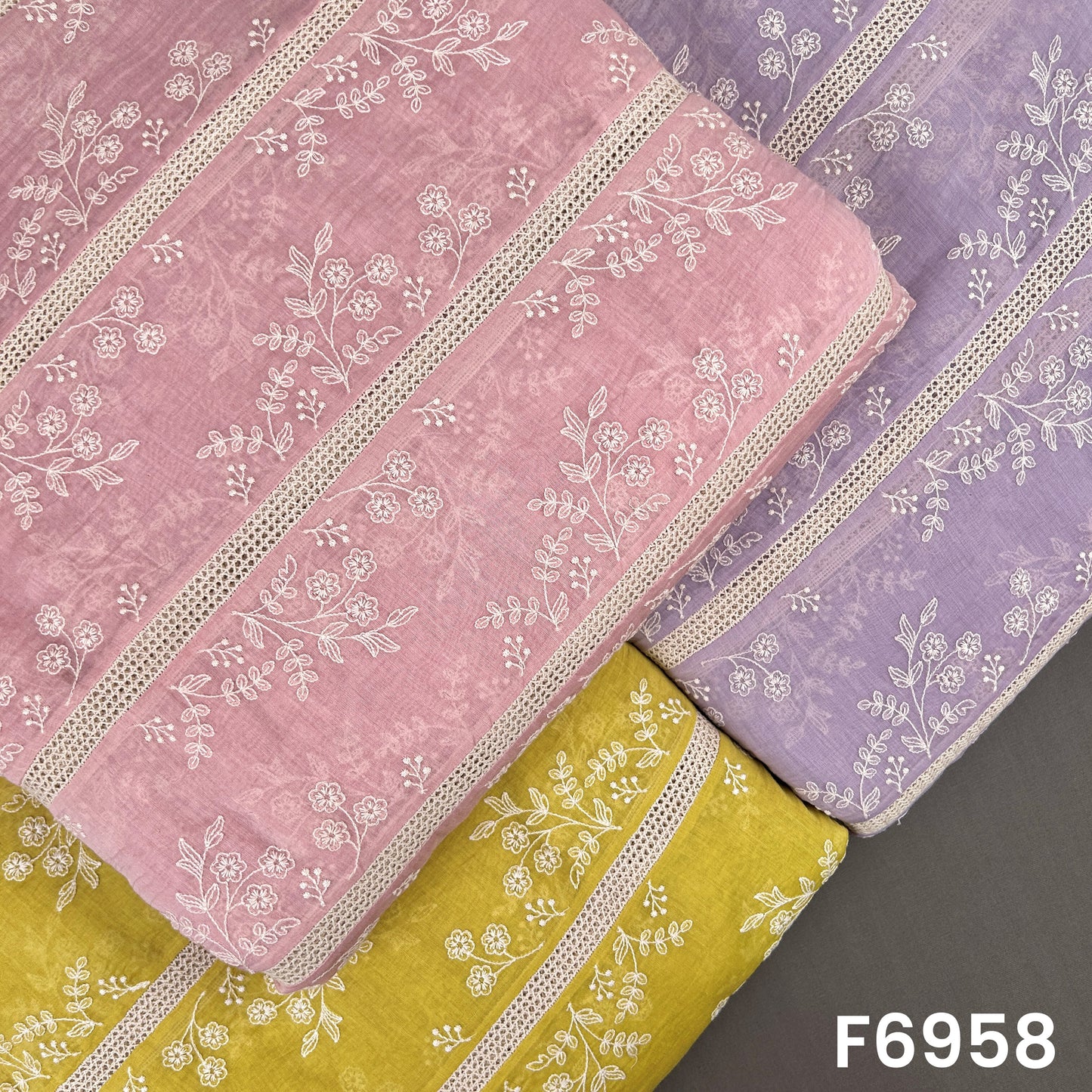 Thread embroidered Mul Chanderi fabric F6958 displayed in blush pink, lavender and mustard shades with white floral stripe work