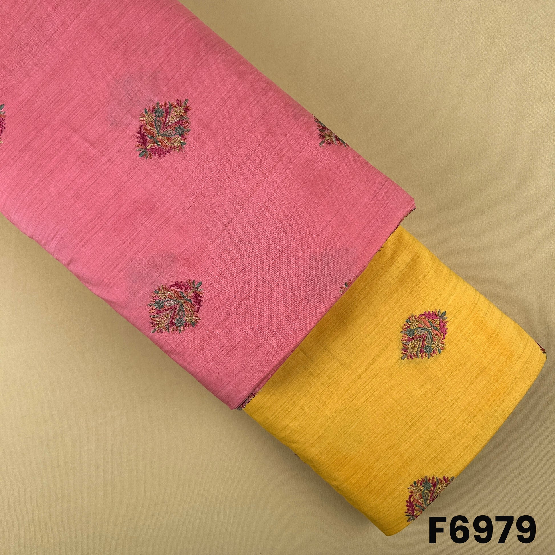 Semi silk fabric F6979 with embroidered paisley motifs in pink and mustard yellow color options