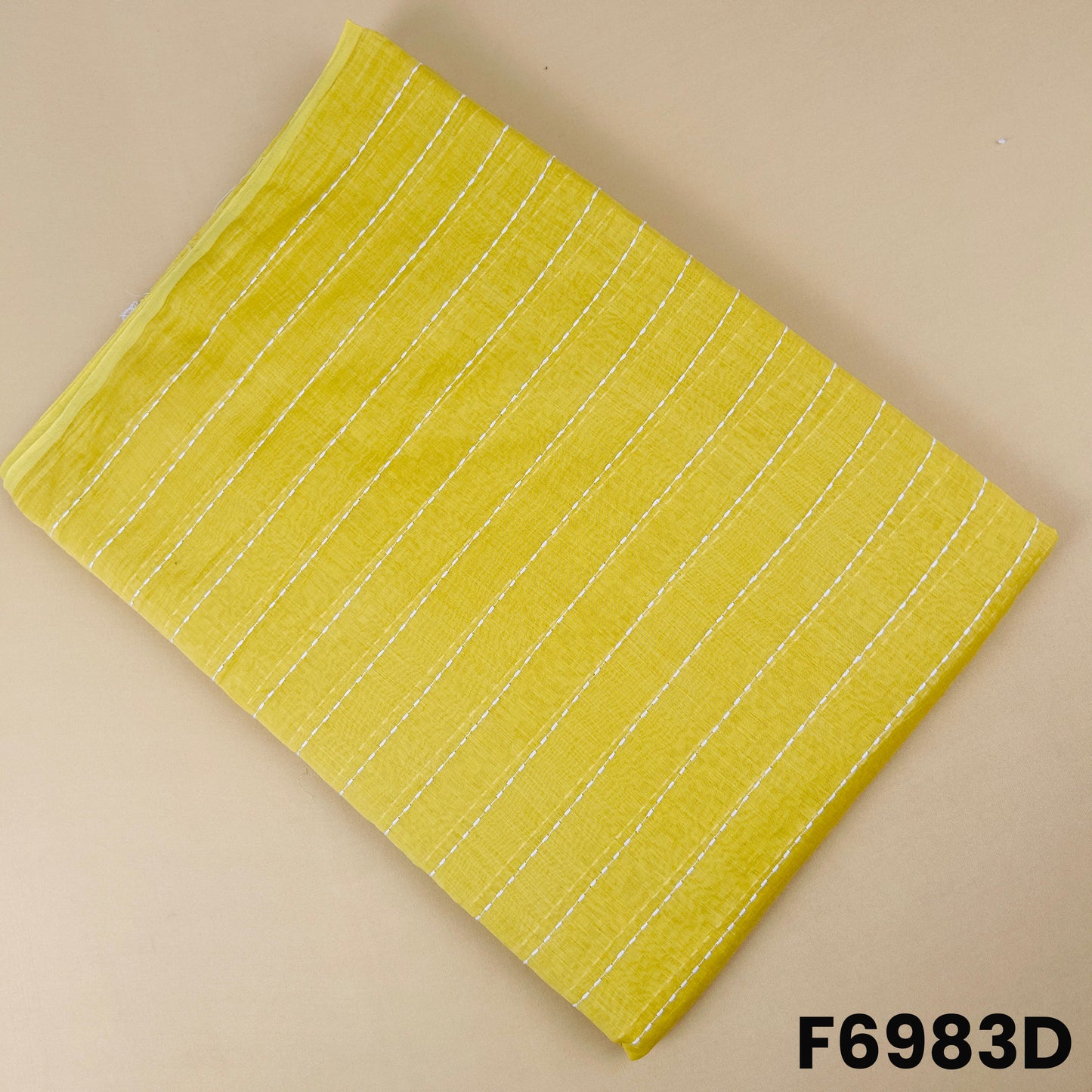 Yellow Mul Chanderi fabric F6983D decorated with subtle thread stripes for bright festive outfits